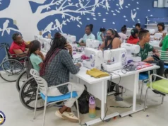 20 women living with disabilities being trained in garment construction at Learning Lab