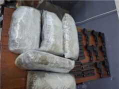 8 guns, 11.2 lbs of ganja found in barrel shipped from NY