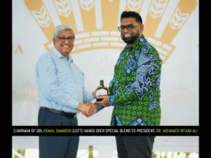 DDL presents special rum blend to Pres. Irfaan Ali in commemoration of CARICOM’S 50th anniversary