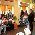 Minister of Housing and Water Collin Croal at the housing outreach in Linden