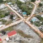 Drone shot of road works in Kwakwani, Region Ten