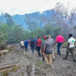 Prime Minister Brigadier (Ret’d) Mark Phillips and Minister of Public Works Bishop Juan Edghill inspect the affected area