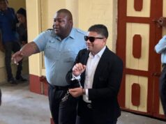 Presidential hopeful Azruddin Mohamed, handcuffed, released on $500K bail over tax evasion charges