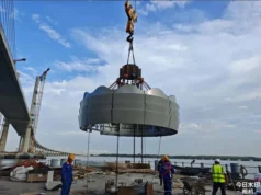All four towers of the new Demerara Harbour Bridge mounted with Cacique Crowns